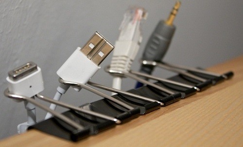 Cables, organized with binder clips.