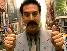 Borat posing for the camera in Times Square, NY.